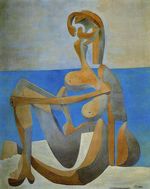 Seated bather on the beach